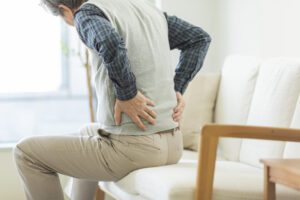 A person dealing with hip pain from sitting in Indiana