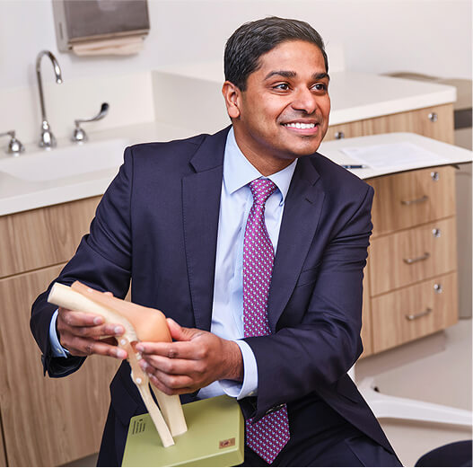 Dr. Joseph Maratt explaining joint replacement