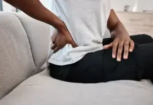 A person dealing with hip tendonitis in Central Indiana